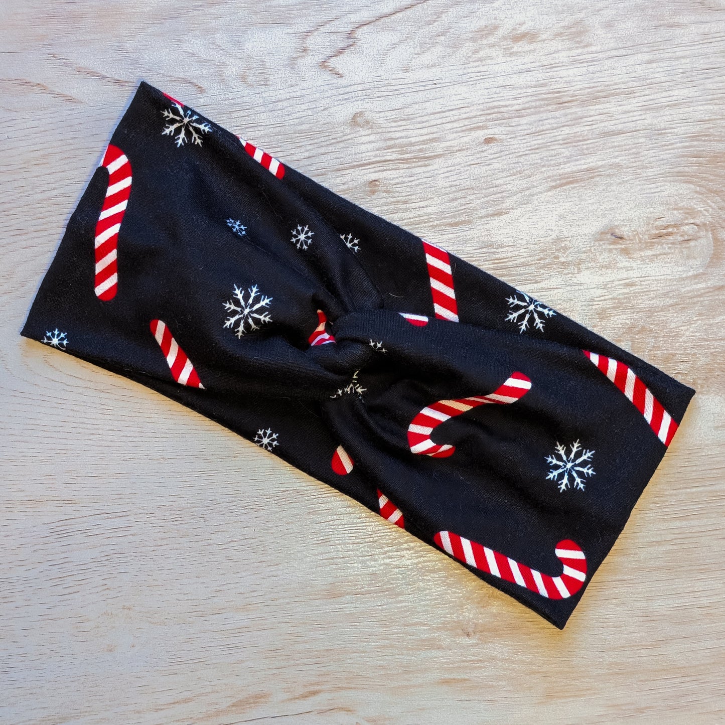 Candy Canes and Snowflakes on Black Knotem