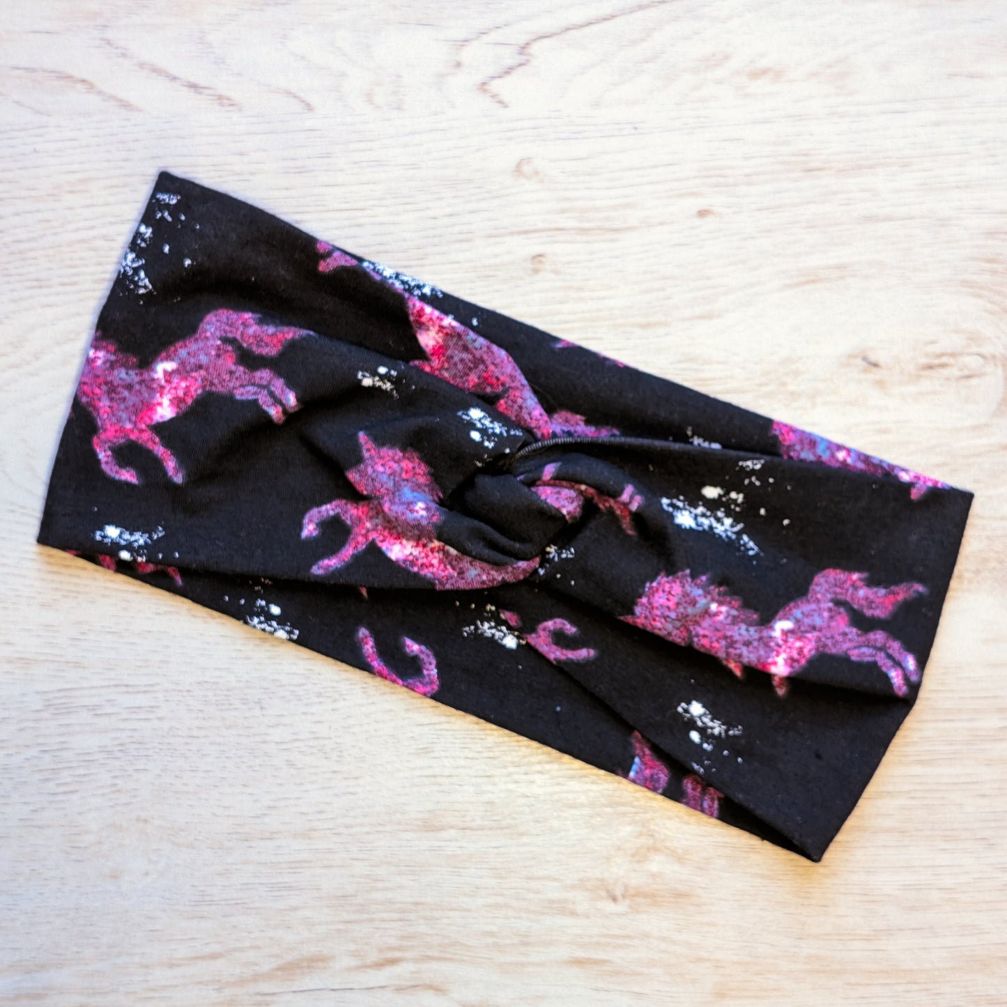 Pink Unicorn on Black Knotem