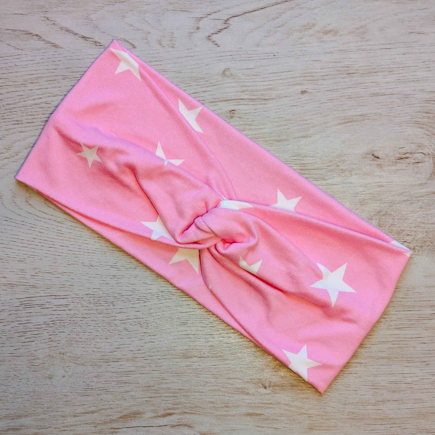 White Stars on Pink Knotem
